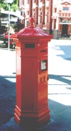 Red hexagonal pillar box.