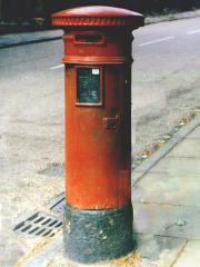 Cylindrical pillar box without cipher.