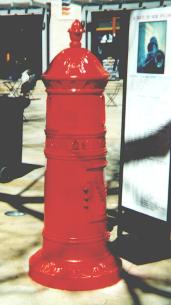 Ornate red pillar box.